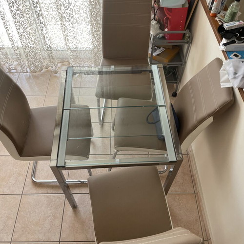 Glass dining table with 4 chairs used, extendable, beige leatherette