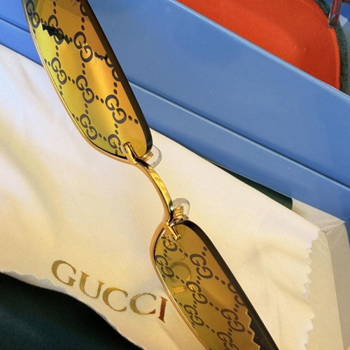 Gucci GG1278S 005 Sunglasses new, gold frame purple mirror