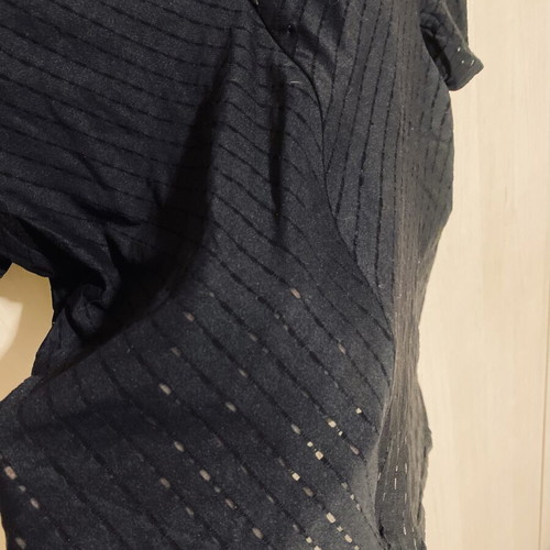 Vogue black elastic blouse with V-neck and zipper