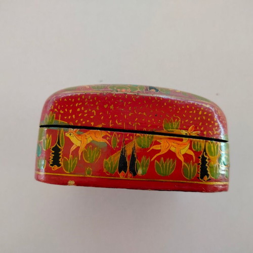 Decorative papier-mache box used with colorful patterns