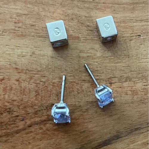 Swarovski earrings new with blue octagonal stones