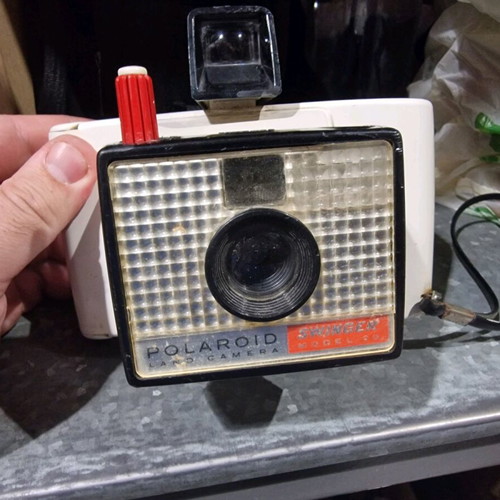 Polaroid camera used for collection or decor