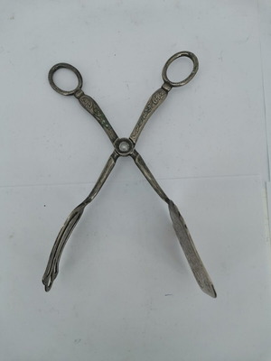 Silver-plated serving tongs used, 1950s vintage