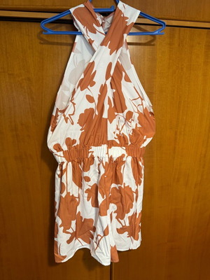 One-piece shorts new with floral design, size L, multicolor