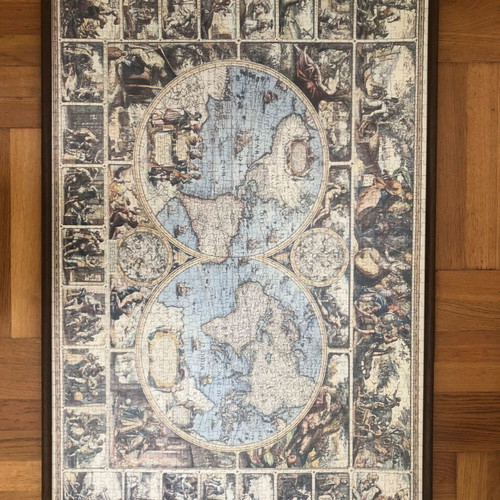 World puzzle with frame used, brown color and glass