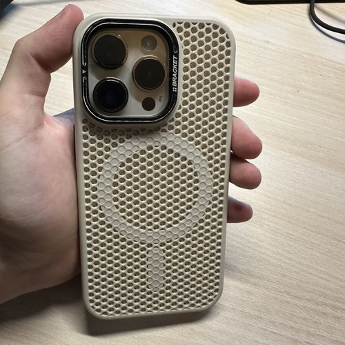 iPhone 14 Pro 128GB used, gold, with two cases, minor back crack