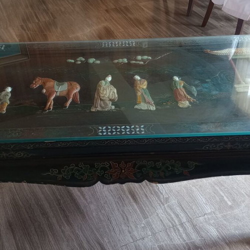 Carved table with folding legs used, traditional Chinese design
