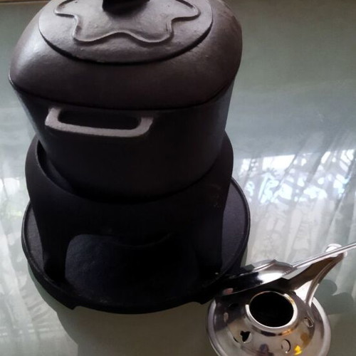 Cast iron fondue set like new