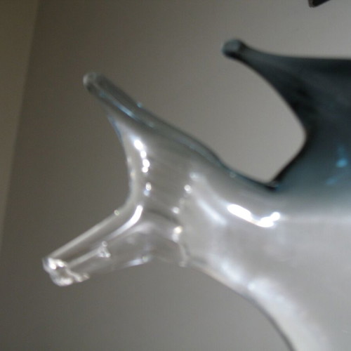 Glass decorative fish used with small tail chip