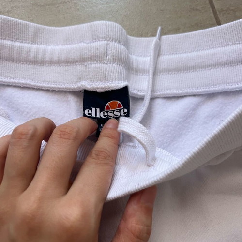 Ellesse white sweatpants like new, slim fit