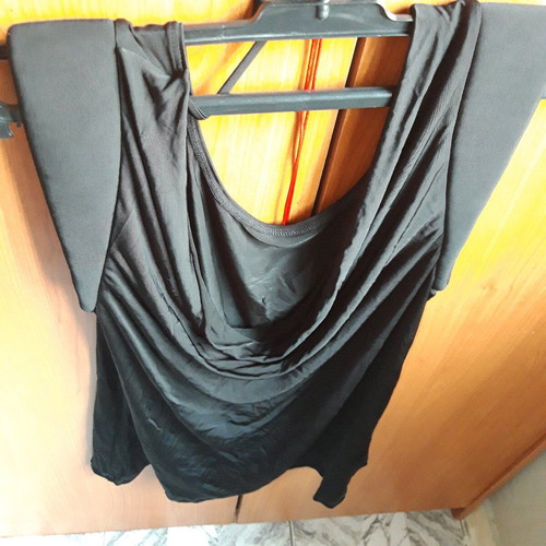 Catwalk women's black blouse medium new, timeless piece