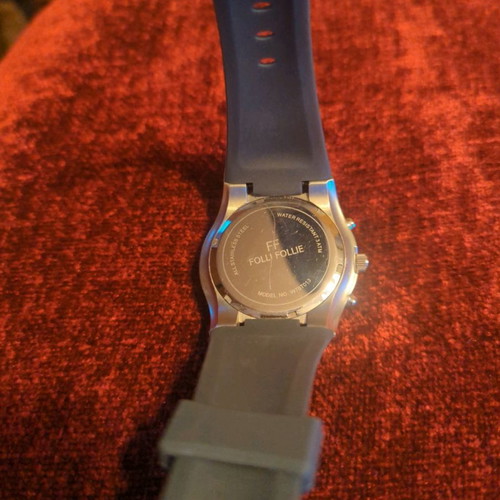 Folli Follie watch used with chronographs and orange dial