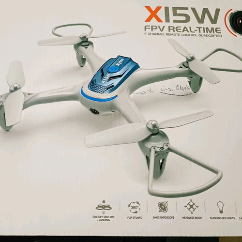 Syma X15W drone used with remote control and video mount