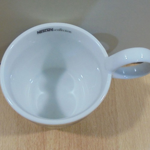 Nescafe Happines promotional porcelain mug used