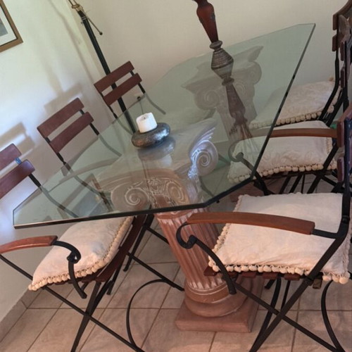 Dining set with six chairs like new, glass top and black frame
