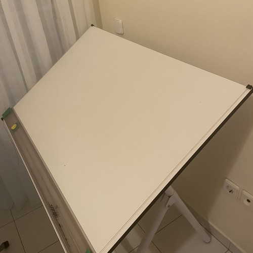 Drafting table used with adjustable parallel ruler