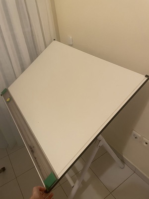 Drafting table used with adjustable parallel ruler