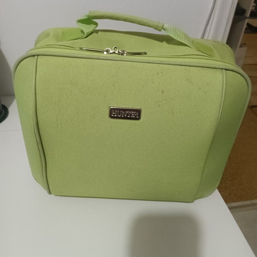 Travel toiletry bag used, green color, spacious
