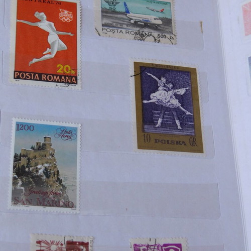 Red album with worldwide collectible stamps