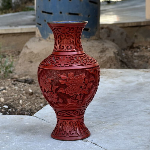 Vintage red carved vase with embossed flowers used, 19cm
