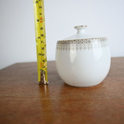 Vintage porcelain sugar bowl with lid used, gold trim
