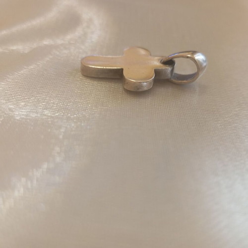 Silver cross pendant like new with polished finish