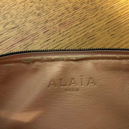 Alaïa clutch bag used, leather handheld