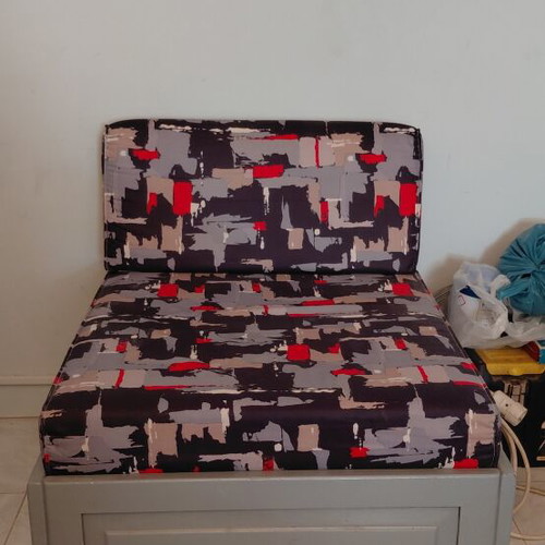 Armchair with storage space used