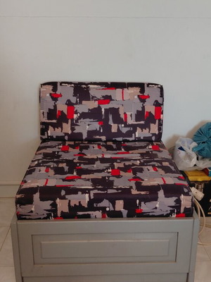 Armchair with storage space used