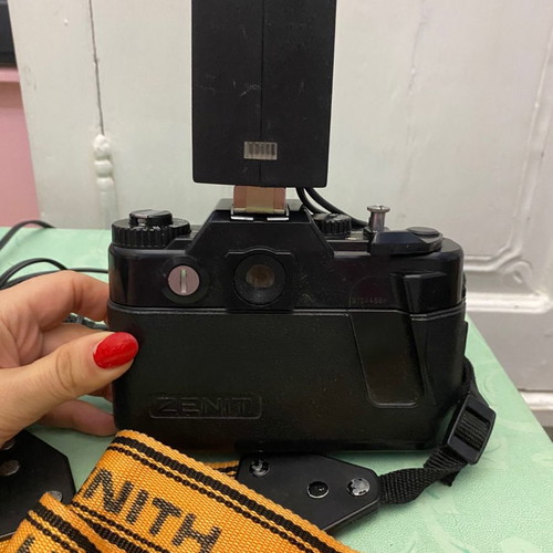 Vintage Zenit camera used with external flash