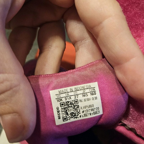 Adidas athletic shoes used for girls size 27 with a scratch