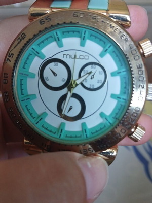 Mulco wristwatch turquoise and gold, used with minor wear