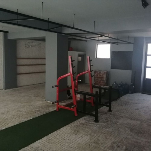 Squat Rack X-Fit 44 like new for multiple exercises and weight storage