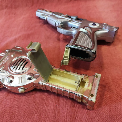 Toys used, space gun and swords with batteries