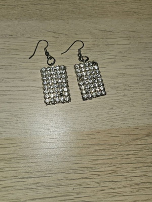 Earrings with rhinestones used, missing some rhinestones