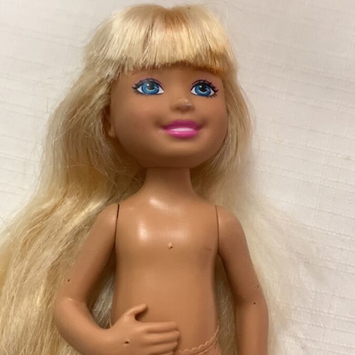 Barbie Chelsea doll like new with dress and shoes