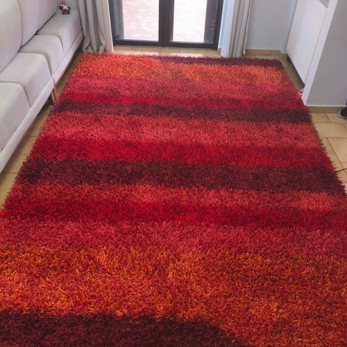 Anatolia Shaggy Rugs set of 2 like new, red and orange tones
