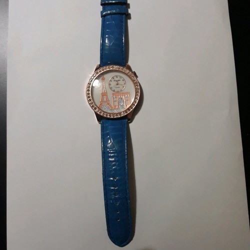 Women's wristwatch with rhinestones and blue straps used