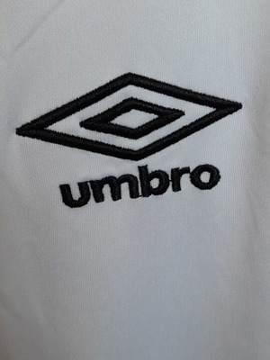 Πόλο αθλητικό Umbro καινούργιο, μέγεθος M, ταιριάζει και σε L, μαύρο και άσπρο