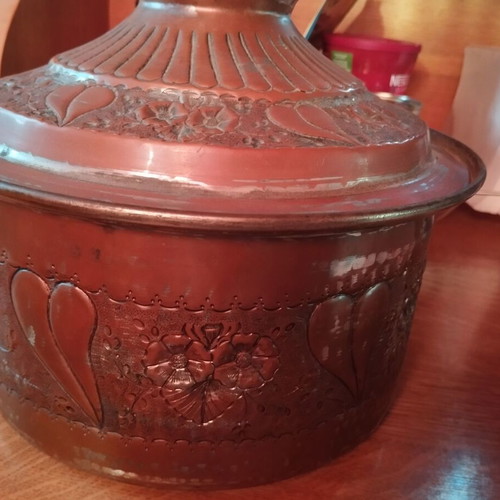 Carved antique pot with copper plating and tin lining