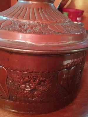 Carved antique pot with copper plating and tin lining