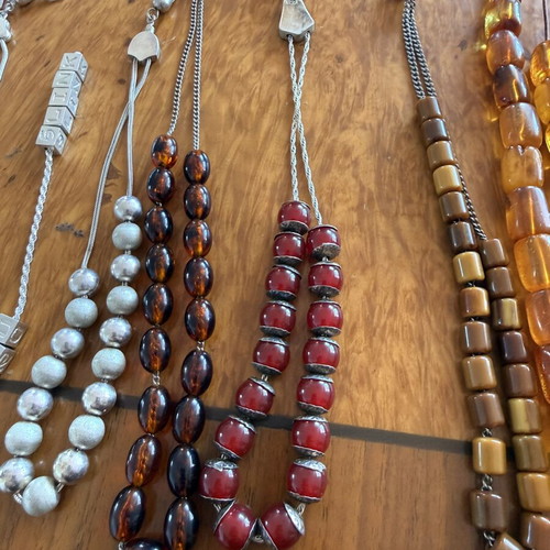 Vintage collection of 17 komboloi with natural amber and 925 silver