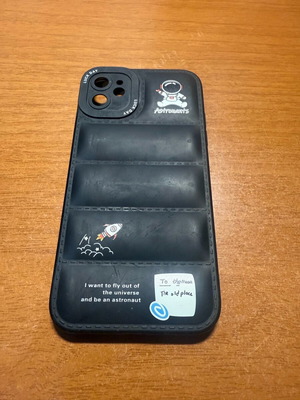 iPhone 11 case used with astronaut design