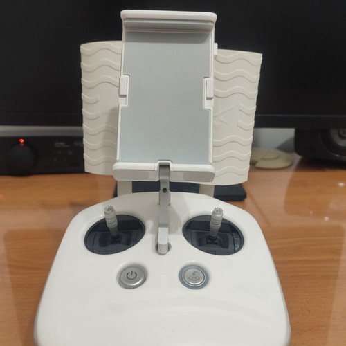 DJI Phantom 4 drone with accessories (no working batteries)