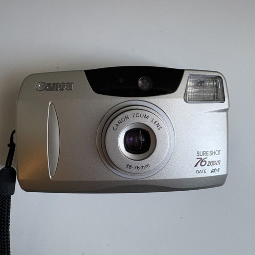 Canon Sure Shot 76 Zoom Date AF film camera with Kodak Gold and Philips battery
