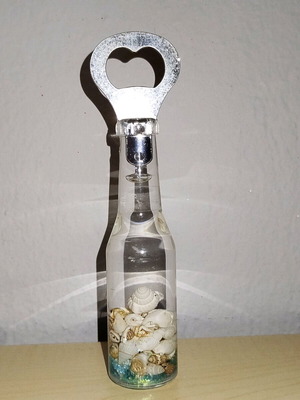 Bottle opener from Limnos like new with shells and glitter
