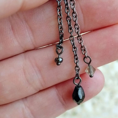 Women's chain necklace with black stones and zircon