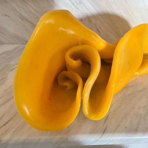 Handmade decorative candle with irregular shape, like new, yellow