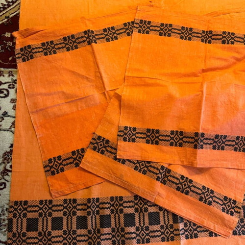 Handwoven tablecloth and napkin set from grandmother's loom