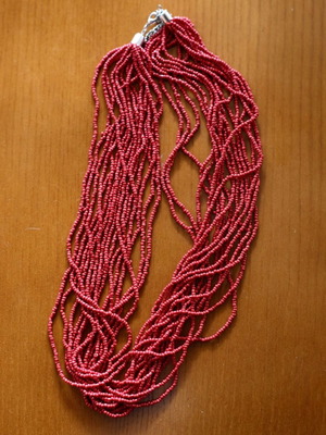 Necklace with red stones used